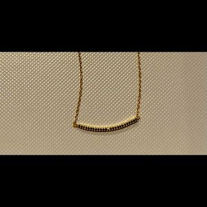 Mizuki 14kt gold necklace with black diamond bar.